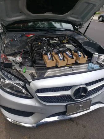 Mercedes engine service with new ignition components